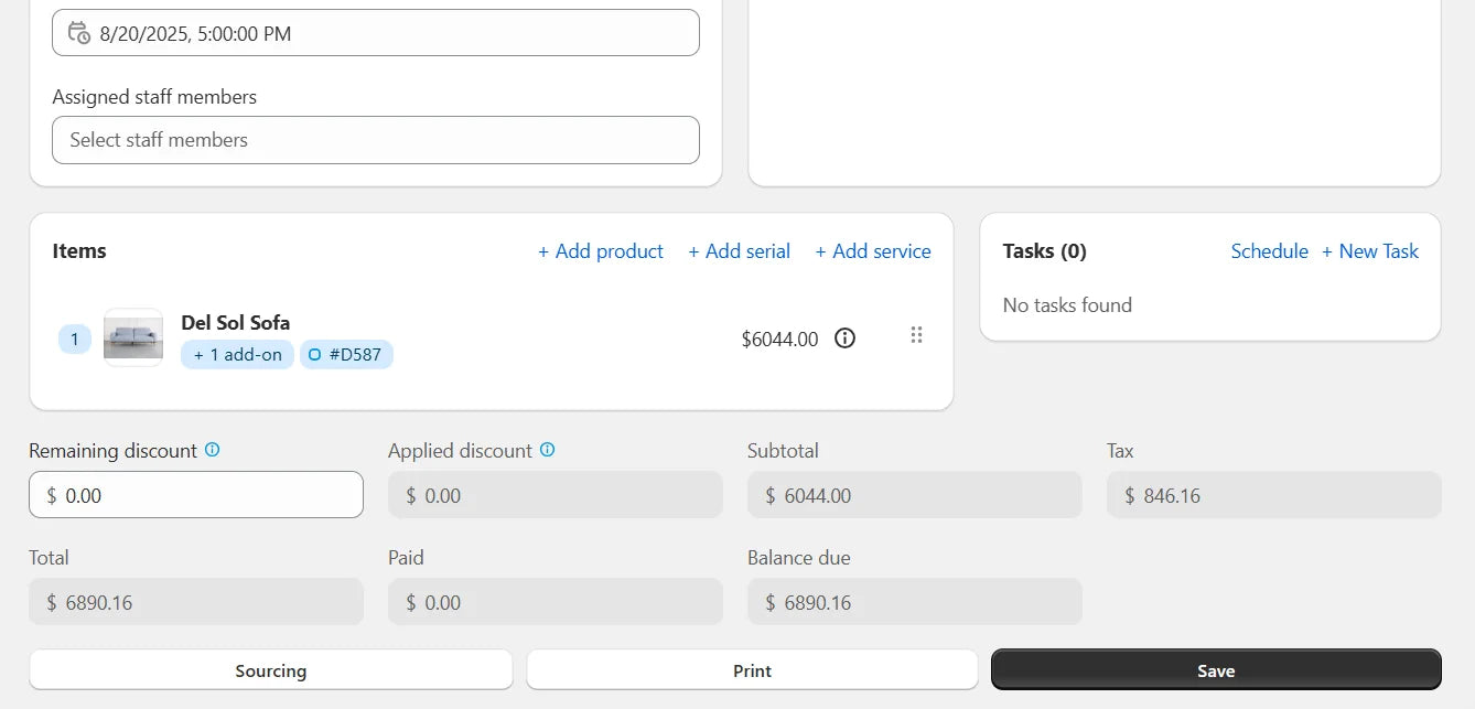 An order line item for a configured sofa carrying an add-on badge, with discount, subtotal, tax, total and balance due beneath it